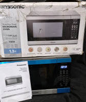 As New in Box Panasonic The Genius Stainless Steel Microwave Oven 1.3 cu.ft. Model NN-SU65LS - Couple Dents Present Retails for $169