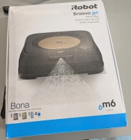 As Is In Box iRobot Bravaa Jet M6112. Does not charge, possibly needs new battery.