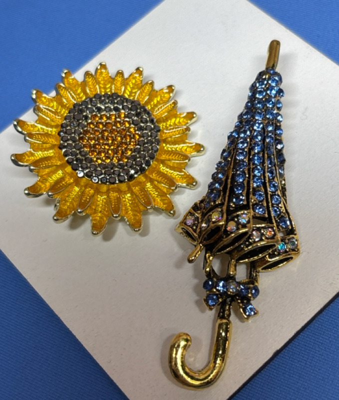 Two Rhinestone Brooches Beautiful Blue Rhinestone Umbrella Parasol / Delightful Sunflower Brooch Approximately 2.5 x .8 Inch and 1.5 x 1.5 Inch