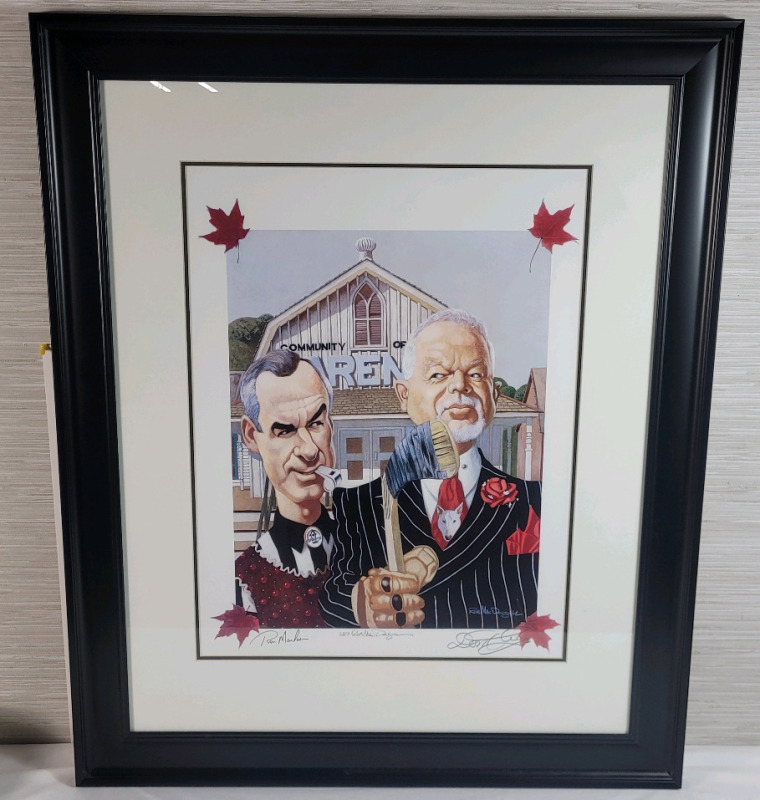 Signed & Numbered Print - Don Cherry & Ron MacLean " Canadian Gothic " by Canadian Artist Rob McDougall , Signed & Numbered Framed Print plus Mpeg DVD . Signed by Don Cherry , Ron MacLean & Rob McDougall . Measures 28.5"&times;35" .