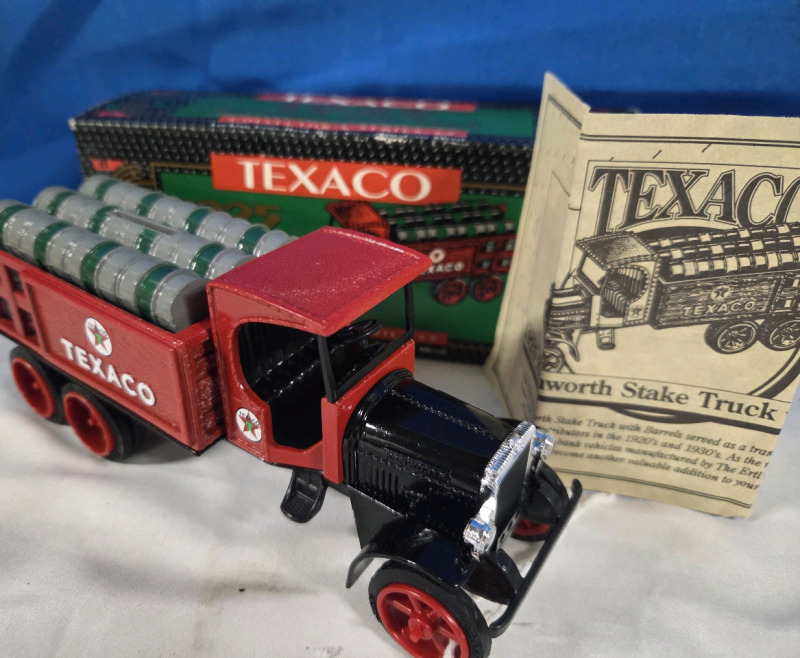 As New | Texaco 1925 Kenworth Stake Truck die-cast metal bank.