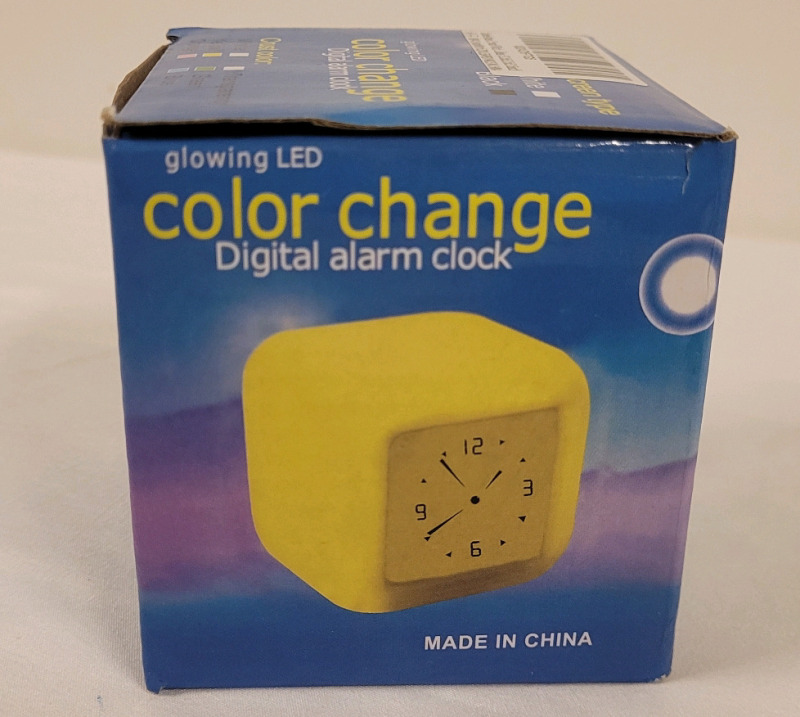 New - LED Color Change Digital Alarm Clock . Box measures 3 1/4"&times;3 1/4"&times;3.5"