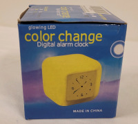 New - LED Color Change Digital Alarm Clock . Box measures 3 1/4"&times;3 1/4"&times;3.5"