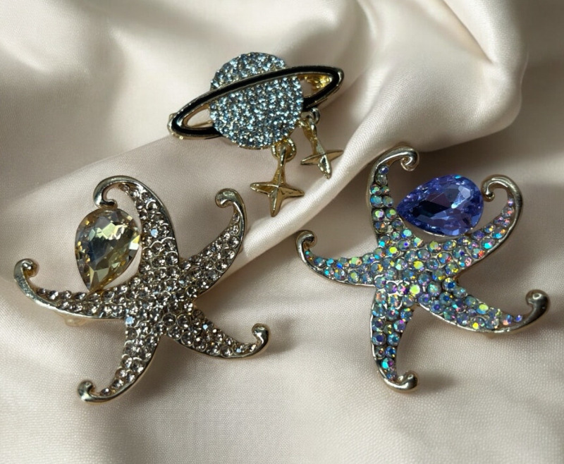 Magical Rhinestone Planet Brooch Two Star Shaped Rhinestone and Cab Brooch one Light Purple Lilac one Peach