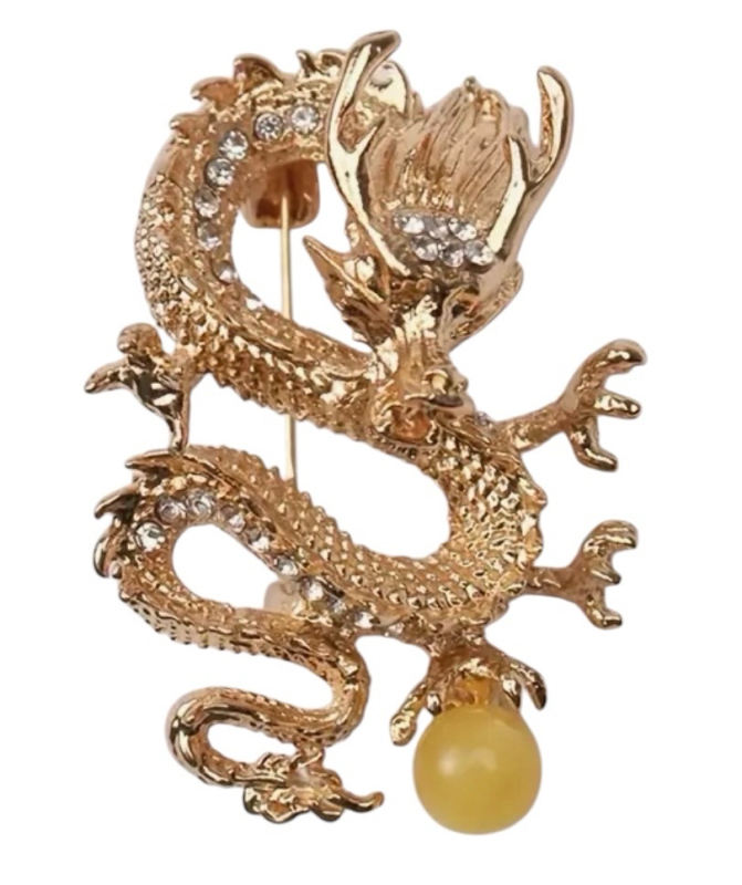 Refined And Elegant Brooch Featuring a Dragon Playing with a Light Amber Colour Pearl Sparkling Pave Rhinestones Approximately 1.25 x 1.75 Inch