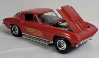 Vintage Red Corvette Stingray Model Kit Car , Assembled . Measures 14" Long & 5 5/8" Wide .
