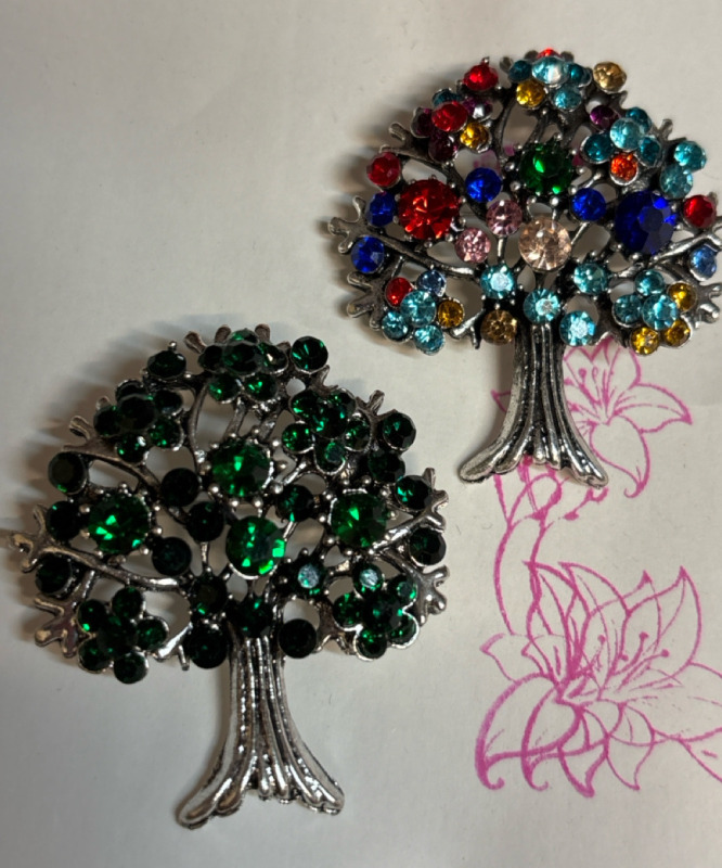 Two Rhinestone Tree Of Life Brooches Starry Multi Coloured and One Emerald Green Approximately 1.85 x 1.65 Inch each