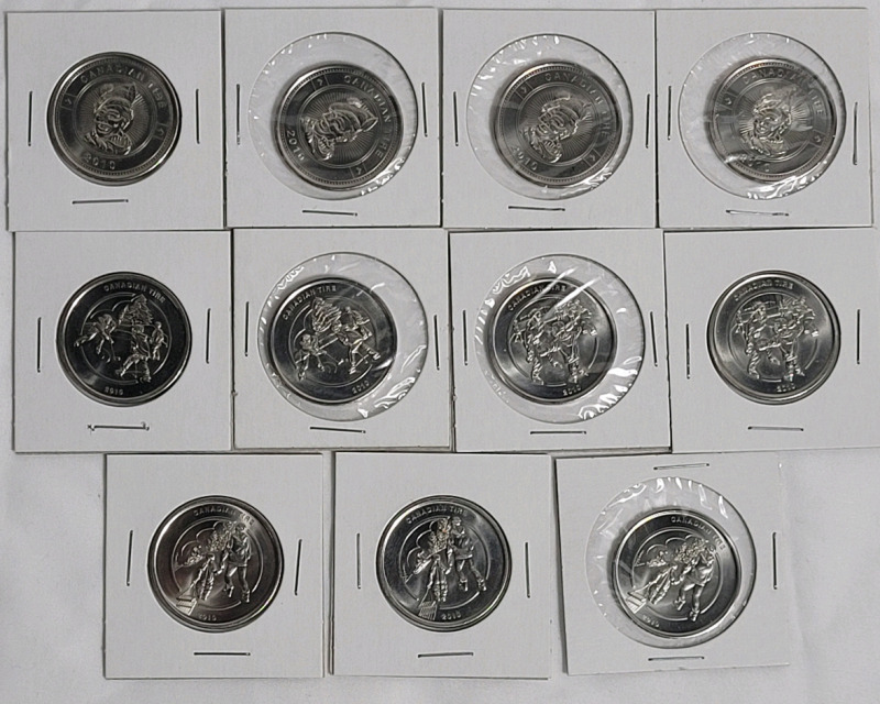 2010 Canadian Tire Limited Edition $1 Cash Bonus Token Coins . Eleven (11) Coins