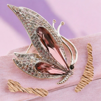 Elegant Butterfly Brooch with Sparkling Rhinestone Embellished Retro Style Curled Antennae Cabs Approximately 1.25 x 1.5 inch