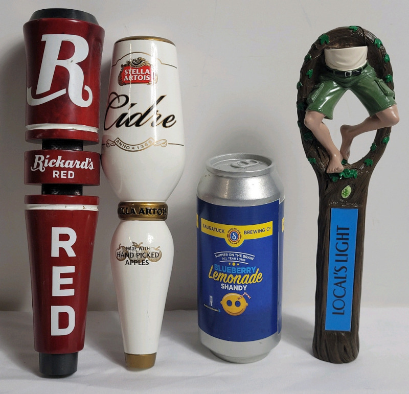 Four (4) Bar Beer Taps . Rickard's Red , Stella Artois Cidre , Saugatuck Brewing & Local's Light . Measures 6.5" to 11" tall