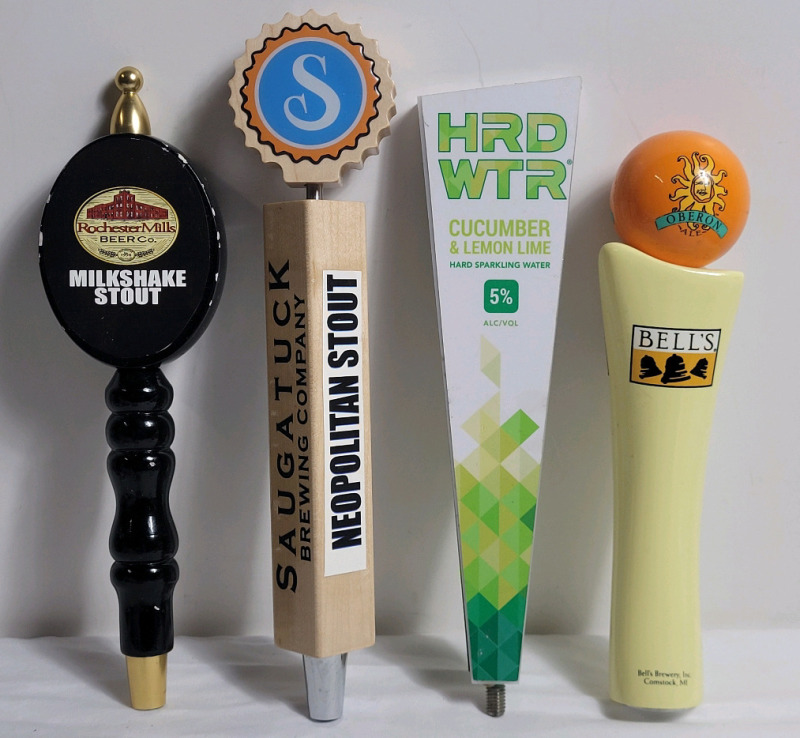 Four (4) Bar Beer Taps . Rochester Mils , Saugatuck , HRD WTR & Bell's . Measures 10.5" to 12.5" tall