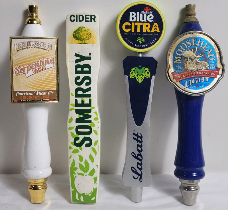 Four (4) Bar Beer Taps . Moosehead Light , Labatt Citra , Somersby Cider & Listermann Brewing . Measures 11" to 11.5" tall