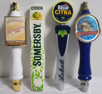 Four (4) Bar Beer Taps . Moosehead Light , Labatt Citra , Somersby Cider & Listermann Brewing . Measures 11" to 11.5" tall