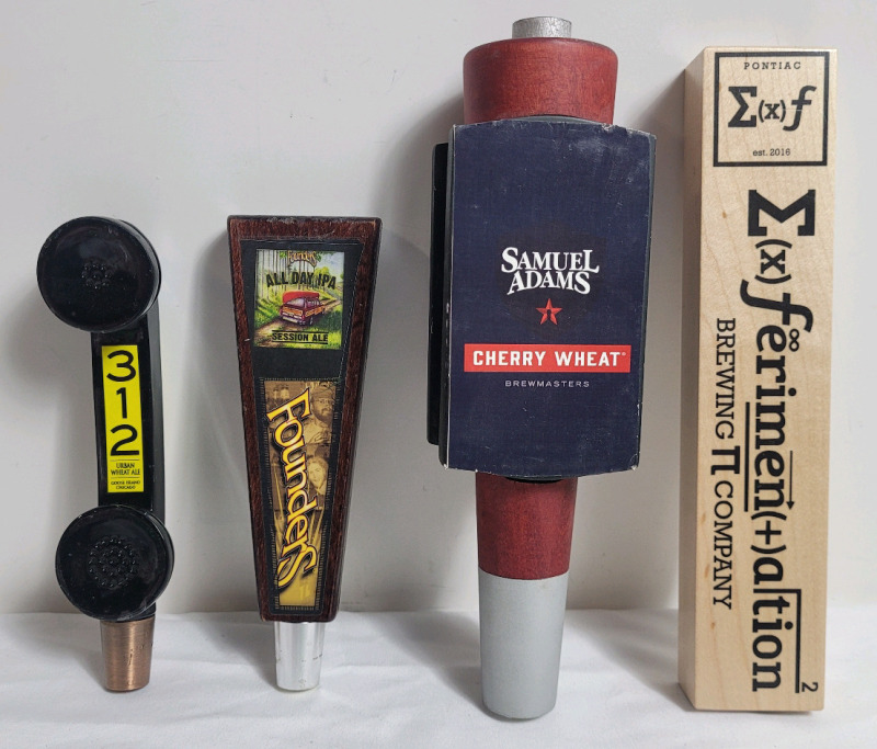Four (4) Bar Beer Taps . Goose Island , Founders , Samuel Adam's Cherry Wheat & Ferimentation Brewing . Measures 11" to 11.5" tall