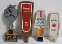 Four (4) Bar Beer Taps . Blake's Hard Cider Co. , Rheingold , Michelob Light & Andeker . Measures 6" to 8.5" tall