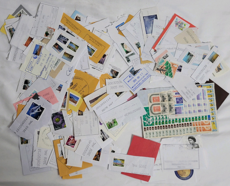 Large Assortment of Mostly Canadian Postage Stamps - Used / Postmarked