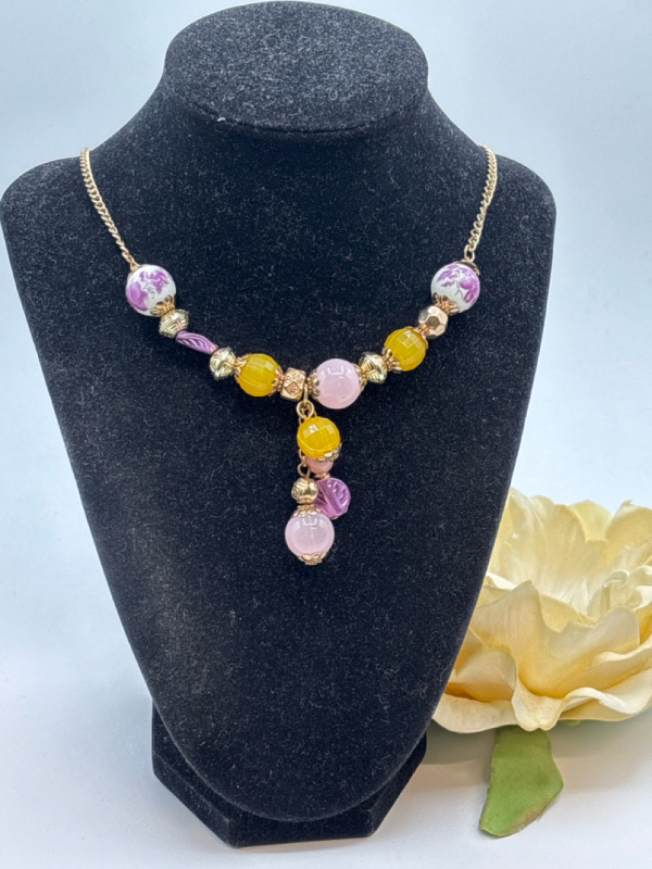 Vintage Yves Rocher Signed Glass and Ceramic Beads in Yellow and Purples lend a spring floral flair to this pretty Necklace