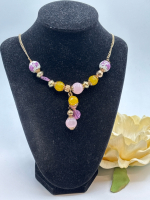 Vintage Yves Rocher Signed Glass and Ceramic Beads in Yellow and Purples lend a spring floral flair to this pretty Necklace