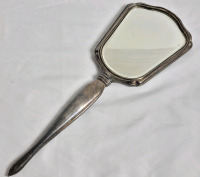 Vintage International Sterling Silver Vanity Hand Mirror . Measures 13 1/8"