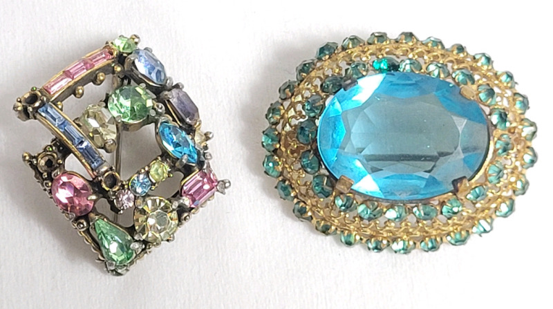 Two (2) Vintage Ladies Brooches . Hollycraft 1950 Multi-gemstone Brooch & Blue Gemstone Brooch . See photos for size