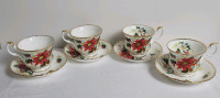 Royal Albert " YULETIDE " Set of 4 Cups & Saucers . All cups and saucers ring true