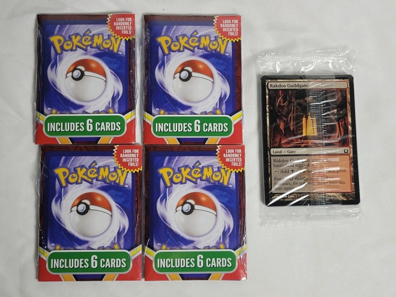 Four (4) Pok&eacute;mon Trading Card Sealed Packs & Magic the Gathering Trading Card Sealed Pack