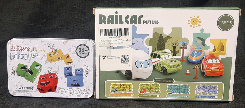 New in Box 25pc Railcar Puzzle Ocean Series (Box Measures 8&frac12;" Long, 6" Wide) & New Expression Puzzle Building Block Tin (Measures 5&frac12;" Long, 3&frac12;" Wide)