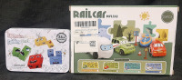New in Box 25pc Railcar Puzzle Ocean Series (Box Measures 8&frac12;" Long, 6" Wide) & New Expression Puzzle Building Block Tin (Measures 5&frac12;" Long, 3&frac12;" Wide)