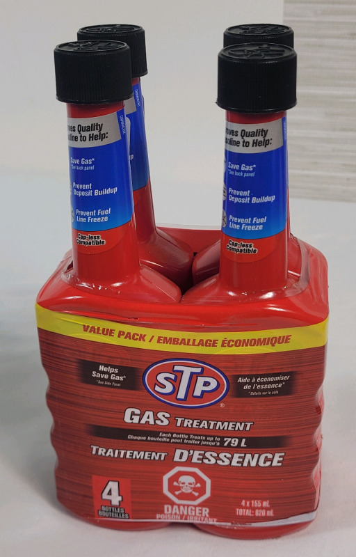 New - STP Gas Treatment Fluid , 4-Pack . Each Bottle Treats upto 79L . Four (4) Bottles , 155ml Bottles