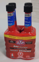 New - STP Gas Treatment Fluid , 4-Pack . Each Bottle Treats upto 79L . Four (4) Bottles , 155ml Bottles