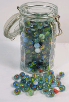 Large Jar of Various Marbles . Jar measures 8" tall