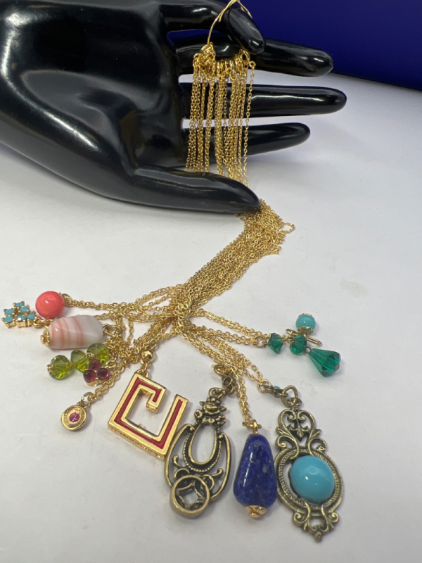 Vintage 12 Gold Tone Necklaces on original ring