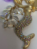 Statement Golden Mermaid Brooch with Rhinestones <br/>Approximately 3.35 x 2.35 inch <br/>Sea Shell with AB resin ? pool of light style drops - 6