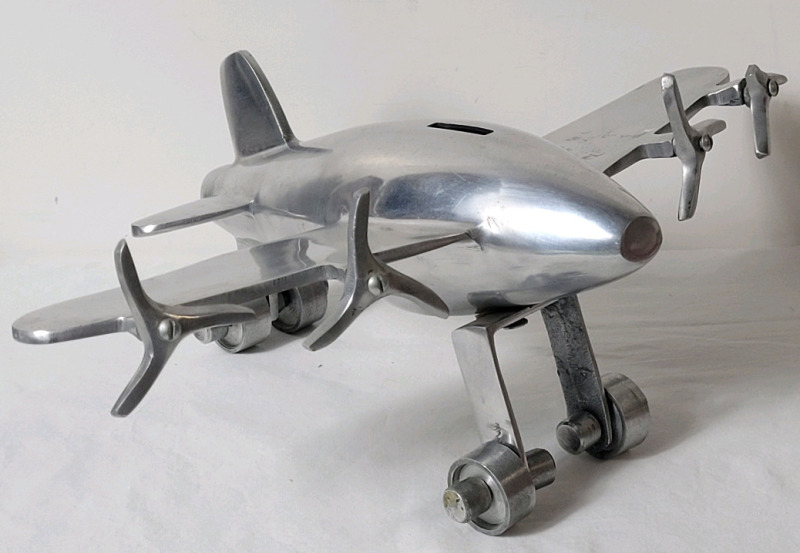 Vintage MCM Cast Aluminum Aeroplane Piggy Bank . Measures 10"&times;15"&times;6" . Missing Bottom Bank Plug & One Propeller Missing Piece .