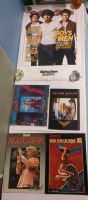 Lot of Music Memorabilia with 2 Vintage Calendars, Vintage Exclusive Poster Book, Vintage Bon Jovi Book and Jonas Brothers Rolling Stones Magazine Poster; Largest Poster 22x34 inches