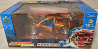 Vintage 2004 Muscle Machines Import Tuner '97 Mitsubishi Eclipse GST 1:24 Scale in Sealed Box