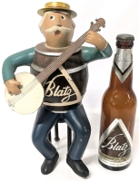 Vintage 1950s BLATZ Milwaukee Wisconsin Heavy Cast Metal Beer Keg Man Banjo Advertising Figure 11.75" Tall & Empty Bottle of Blatz With Cap On