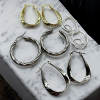 Four Sets of Hoop Pierced Lever Snap in Earrings