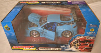 Vintage 2004 Muscle Machines Import Tuner '97 Mitsubishi Eclipse GST 1:24 Scale in Sealed Box