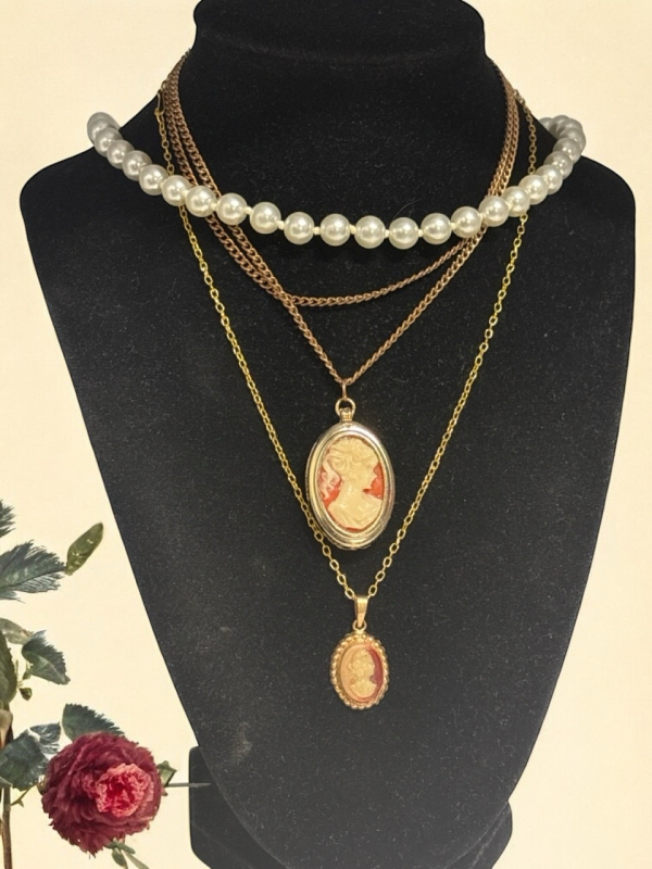 Two Vintage Cameo Necklaces- One is locket and Knotted Faux Pearl Strand more details in description