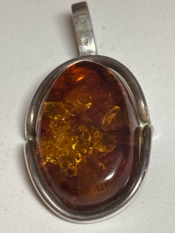 Vintage Sterling Baltic Oval Amber Pendant Approximately 1.75 in with Bale Inclusions Unique Frame Worn stamp