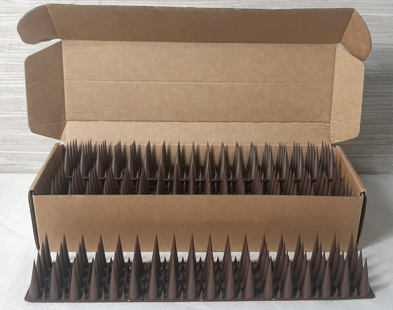 New in Box Ten Pack of Brown Defender Spikes to Dissuade Birds, Animals | Rows are 11&frac12;" Long, 2" Wide, Spikes are 1&frac12;" Tall
