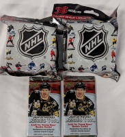 4 New NHL Collectibles. 2 Sealed Trading Cards + 2 Sealed Figurines.