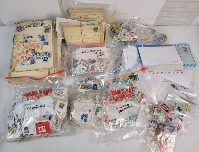 Large World Postage Stamp Lot . Canada , USA , New Zealand , Caribbean Islands , Great Britain plus more