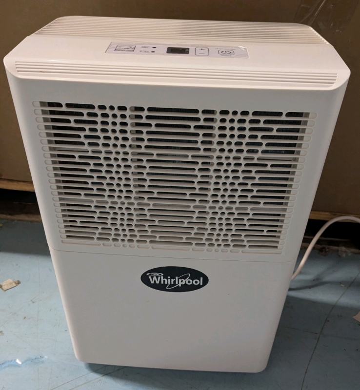 Whirlpool Dehumidifier. Tested for power. Stands 20" Tall. As is.
