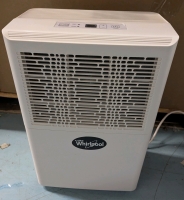 Whirlpool Dehumidifier. Tested for power. Stands 20" Tall. As is.