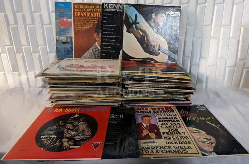 A lot of more than 50 records including: Johnny Cash, Elvis, the Inks Spots and More! - Mixed Genre Lot