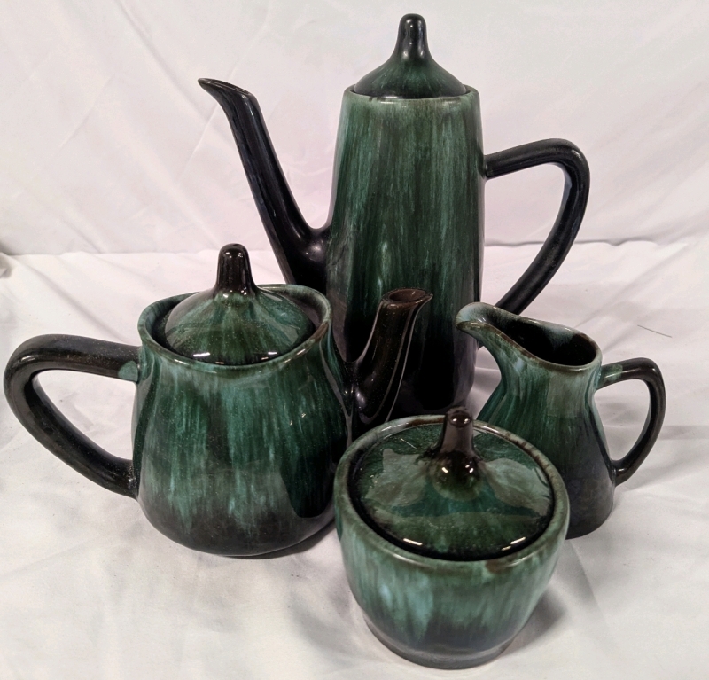 4 Blue Mountain Pottery Vessels. Tallest Stands 10" Tall.