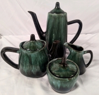 4 Blue Mountain Pottery Vessels. Tallest Stands 10" Tall.