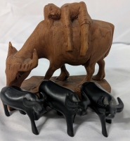 4 Buffalo Figures. Tallest Made of Wood and Measures 4" Tall.